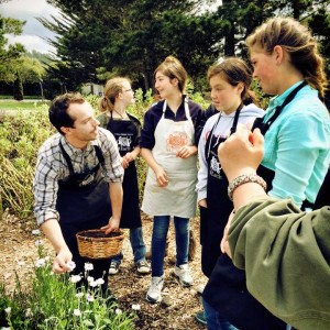 Chef James Anderson shows students at MEarth how to cook with fresh garden  produce