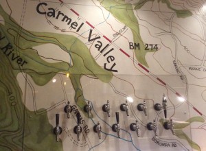 The mural behind the taps is a topographic map by a local artist.